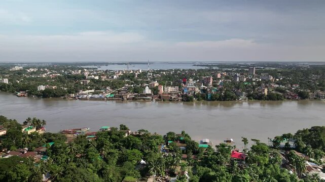 Drone footage of flood submerging homes in Sunamganj, Bangladesh due to hill runoff and river overflow