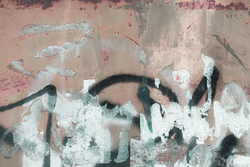 Fragment of a rusty grunge surface. Orange-green background color. Scuffs and peeling of old paint....