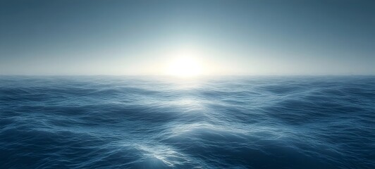 Obraz premium A serene ocean landscape at sunrise, featuring gentle waves reflecting the soft glow of the early morning light against a tranquil horizon.