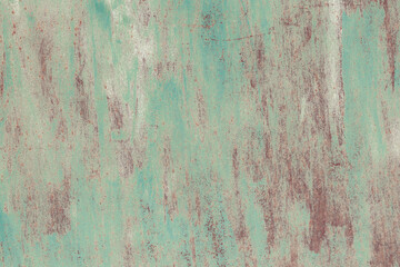 Fragment of a rusty grunge surface. Orange-brown background color. Scuffs and peeling of old paint....