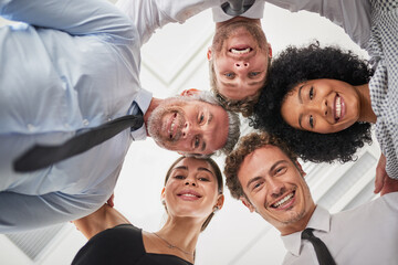 Below, huddle and portrait of business people in office together for solidarity or unity as group....