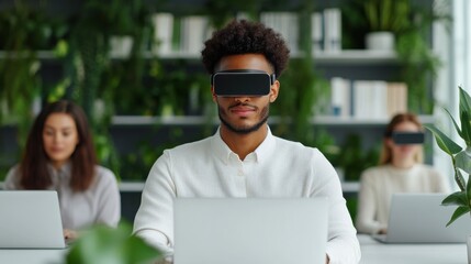 Young Professionals Engaged in Collaborative Technology Work