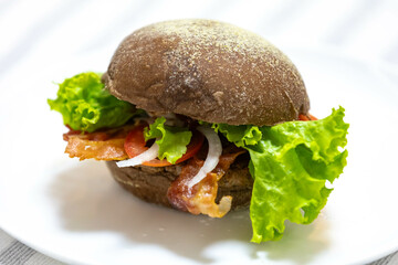 Bacon and salad burger sandwich on Australian bread