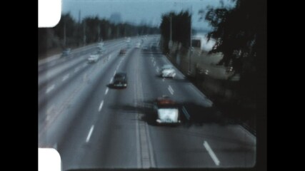 Highway Traffic 1959 - Cars travel on a highway north of Chicago, Illinois in 1959.