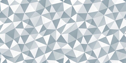 Fototapeta premium A seamless pattern of abstract gray and white triangles, forming a complex geometric pattern, creating an illusion of depth and movement