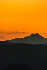 Vertical Beautiful Mountain landscape foggy windy mountain range green landscape asian farm. Vertical Amazing Landscape mountain green field meadow white cloud blue sky sunrise. Countryside scenery