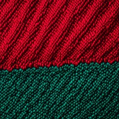 Obraz premium Close-up of red and green knit fabric texture.