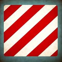 Fototapeta premium Red and white diagonal stripes pattern on textured background.