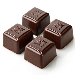 The nut chocolate,Directly above shot of cherries in box against white background,Pile of chocolate square candies with cocoa filling isolated on a white background.