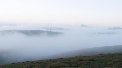 Fototapeta premium Misty morning landscape with foggy hills, gentle, fog, outdoor