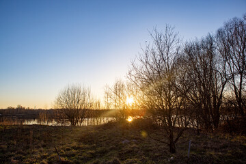 A truly stunning sunset that beautifully brightens the landscape with vibrant colors and serene, tranquil waters