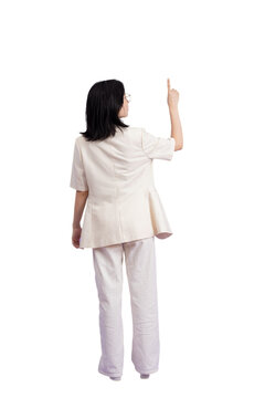 Young Asian businesswoman wearing white jacket on purple background