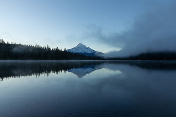 Oregon's icon and the tallest peak of Mount Hood, captured from Lost Lake during fall season at golden hour. High quality picture for download.