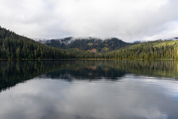 Beautiful misty fall weather, autumn vibes at Lost Lake in Oregon, near Hood River and Mount Hood, captured during early morning. Mystic fall vibes and scenery. 