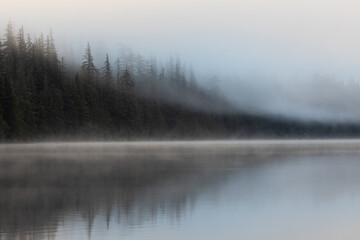 Beautiful misty fall weather, autumn vibes at Lost Lake in Oregon, near Hood River and Mount Hood, captured during early morning. Mystic fall vibes and scenery. 