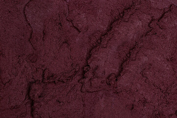 Lipstick texture in burgundy color