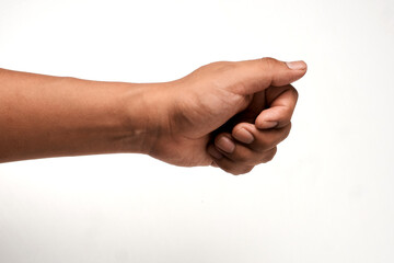 Hand of a Latino man holding something, partially closed in the shape of a fist, isolated on white...