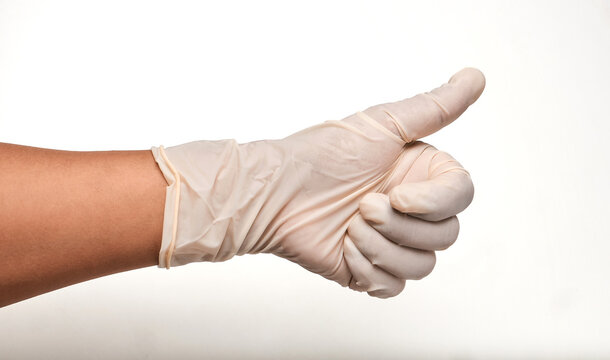 close-up of Italian gesture on the right with white background.
