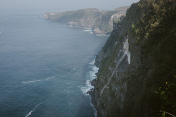 Cliffside near Kelingking Beach, a famous location on Nusa Penida island, Indonesia.