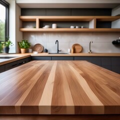 Empty wooden table with a natural oak finish, positioned against a blurred modern kitchen background