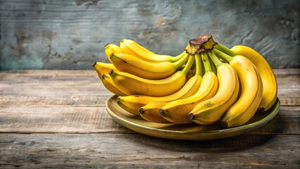 A batch of bananas piled on a small plate aerial view