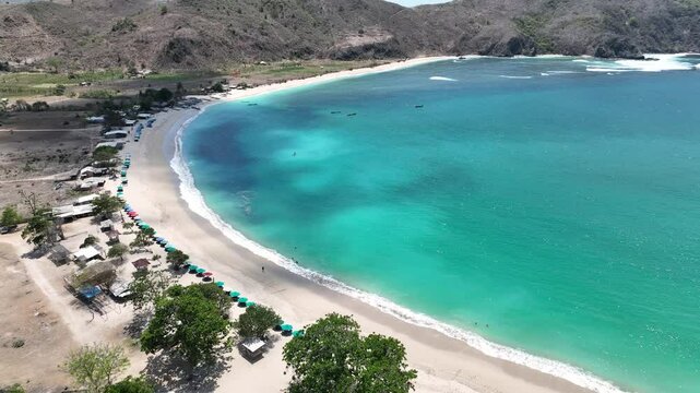 Tropical island beach vibes Mawun Beach Kuta Lombok Indonesia aerial views 4k mavic 3