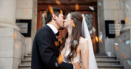 Couple, kiss and hug on wedding outdoor for celebration, unity success and marriage commitment....