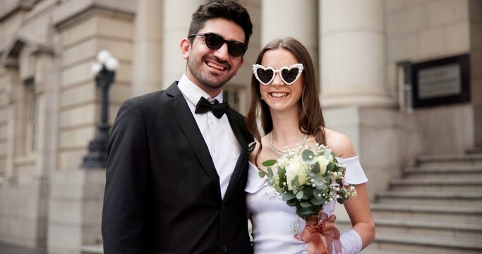 Wedding, sunglasses and couple in city for love at marriage ceremony, celebration and court certificate. Romance, fashion and portrait of happy man and woman for commitment, partnership and promise