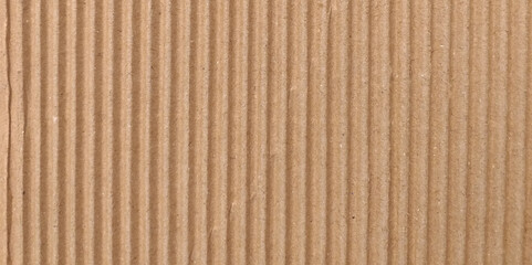 Craft brown paper texture surface macro close up view. Kraft paper texture vertical striped pattern for wrapping. Kraft paper texture background.