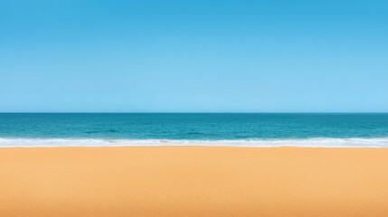 Fototapeta premium Serenity at the Beach with Golden Sand and Blue Sea