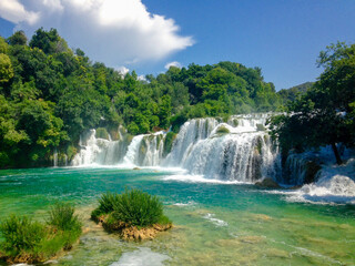 Fototapeta premium Waterfall in Lush Forest