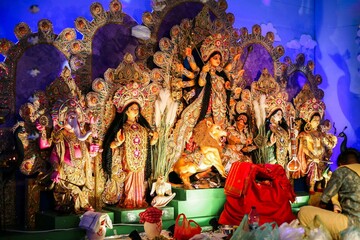 Colorful Durga Puja pandal with intricate decorations.