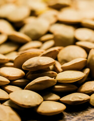 Dry lentils close up background. Vertical macro photo.