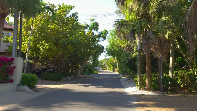 POV driving on Casey Key scenic road in sunny Florida