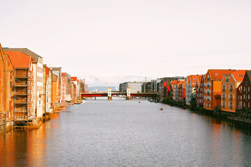 Colorful wooden buildings by the riverside