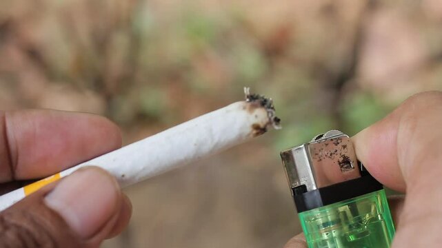 Turning on a cigarette with a lighter