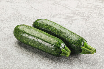 Raw green ripe zucchini vegetable