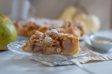 pear crumble cake in a baking form 