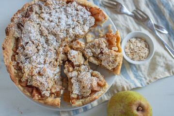 pear crumble cake in a baking form 