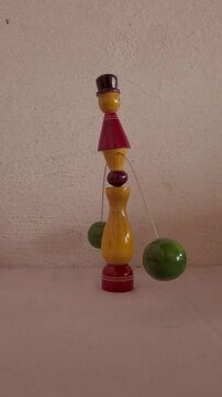 Mysuru, Karnataka, India-October 2 2024; A Colorful Self balancing Toy made of soft wood by Channapatna artisans for children in Mysore, India.
