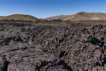  North Crater Pahoehoe Flow. Aa lava flow. Big Craters Slab Lava Flow. North Crater Flow Trail / Craters of the Moon National Monument & Preserve. Volcanic Field. Idaho's eastern Snake River Plain.
