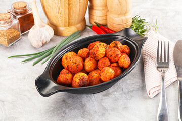 Baked young potato with paprika