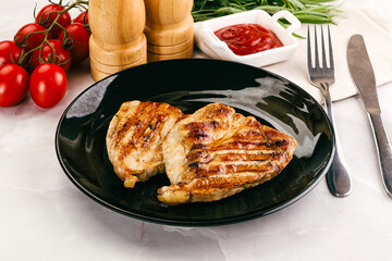 Grilled pork steak with sauce