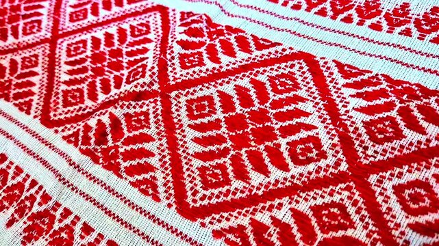 gamosa or gamusa from Assam. gamosa textile pattern. gamosa or gamusa is an article of significance for the indigenous people of Assam, India. It is generally a white rectangular piece of cloth . 