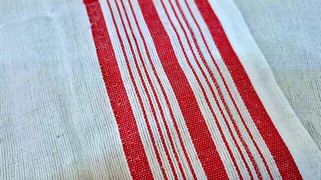 gamosa or gamusa from Assam. gamosa textile pattern. gamosa or gamusa is an article of significance for the indigenous people of Assam, India. It is generally a white rectangular piece of cloth . 
