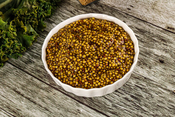 Mustard sauce with seeds in the bowl