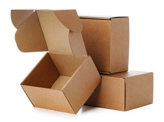 Stacked brown cardboard boxes in various sizes arranged on a white background