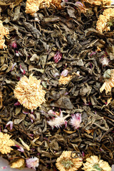 Black tea background, dried tea close up, macro