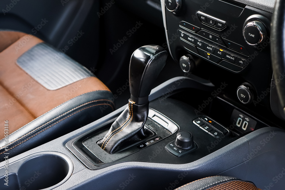 Wall mural automatic transmission shift selector in the car interior. closeup a manual shift of modern car gear