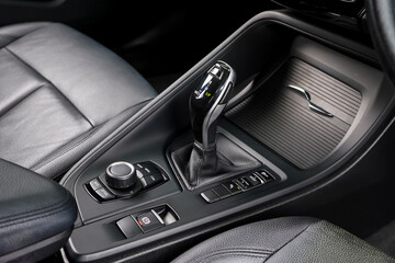automatic transmission shift selector in the car interior. Closeup a manual shift of modern car...